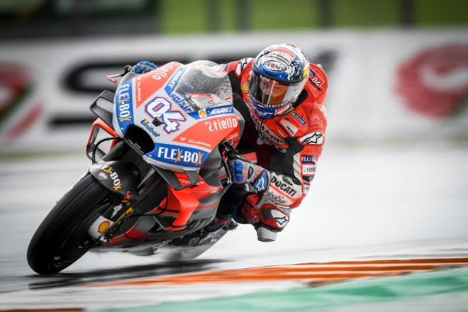 Dovizioso wins dramatic red-flagged rain dance