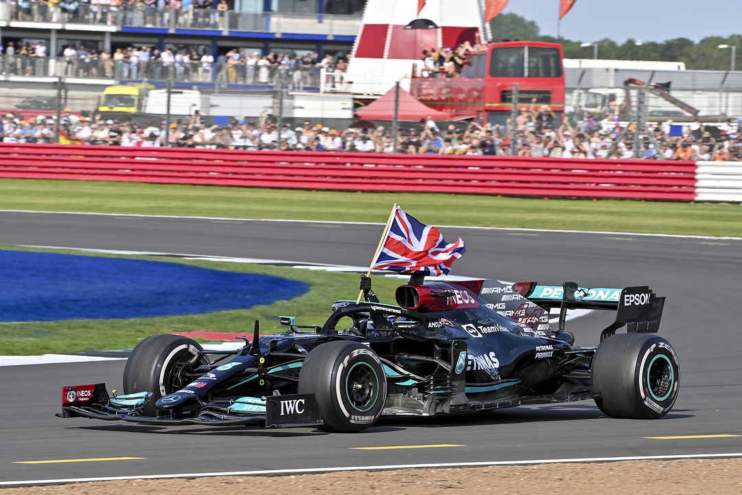 Hamilton claims fourth win as on-track collision ends Verstappen race