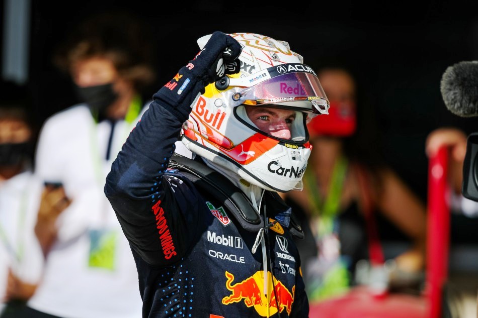 Max Verstappen holds off late pressure from Hamilton