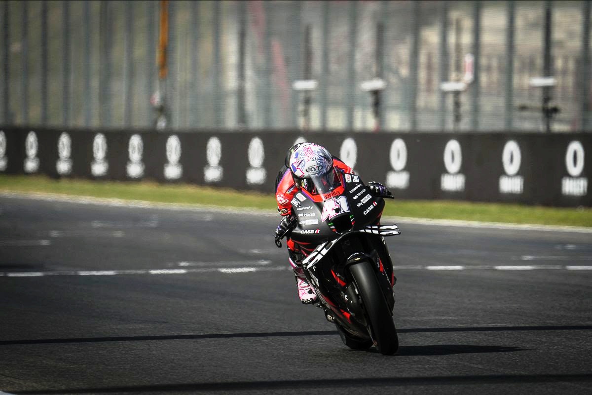 Aleix Espargaro and Bagnaia split by just 0.049 on Friday